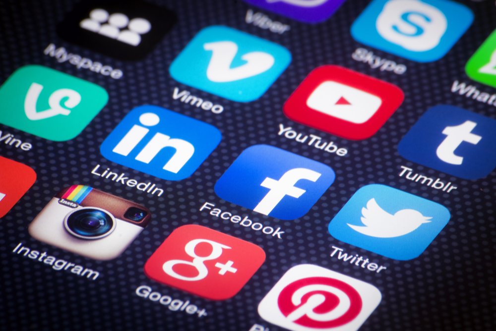 Hands on Table with Social Media Concepts